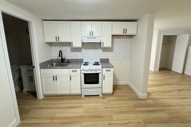 visit hubrealtyproperties.com - Mission Hill, studio with brand new kitchen, basement level, on green line T Apartments