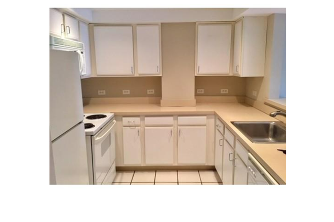 kitchen - Wonderful Unit with  2 beds, 2 baths, AC, Laundry on Each floor Condo