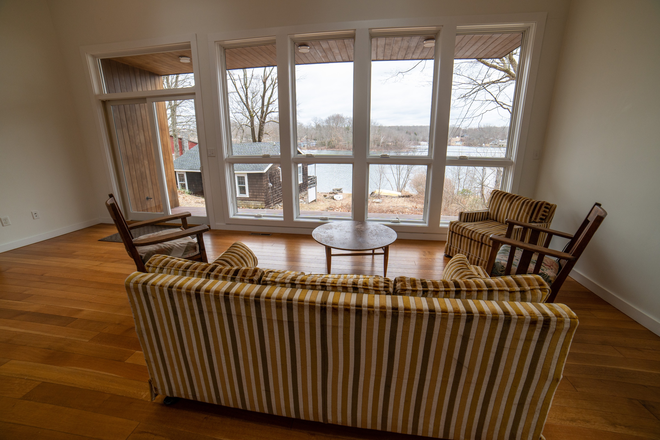 Living room view to the lake - Modern Lakefront Home