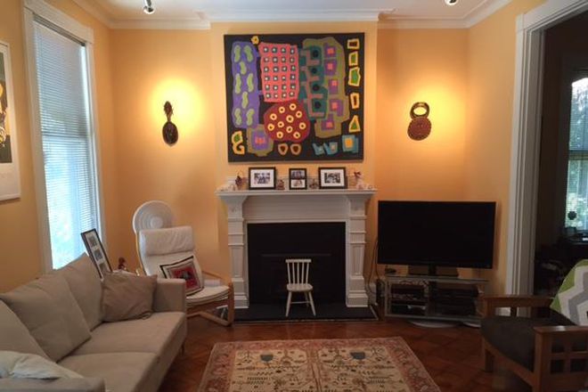 ground floor living room - Entire 3rd floor of historic home on quiet one block street off of 48th Street...