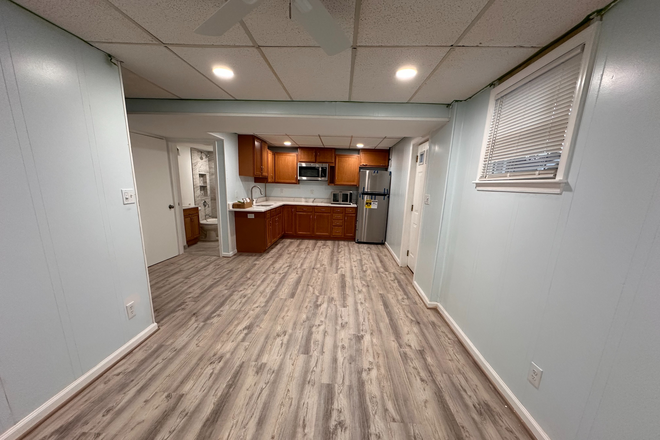 Living room and kitchen - open setup. - Lastner Lane House