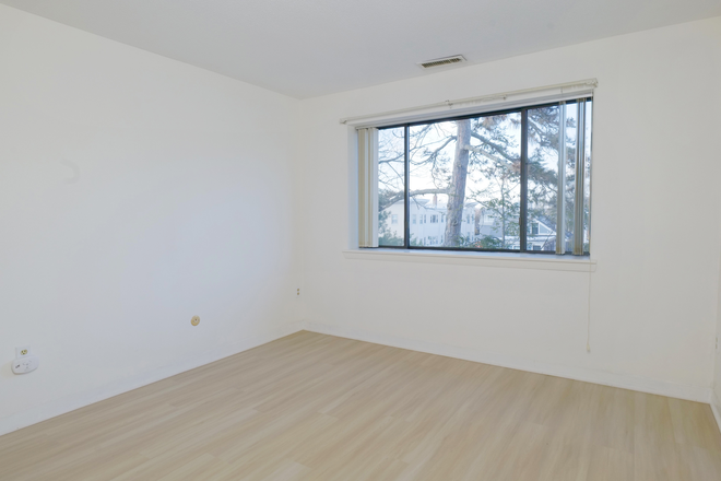Bedroom off living room (w/attach. green bathroom) - Spacious 3BR, 2 Bath, Offstreet Parking, +Sunny Balcony! Condo