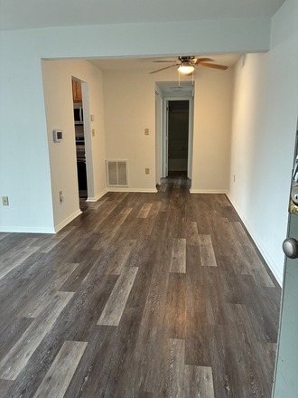 Living Room - First floor apartment immediately available in Foxridge - first month off!