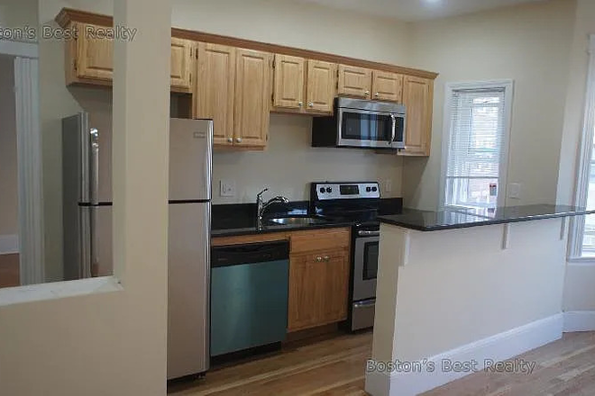Newly updated kitchen - Rare Find! Heart of allston and steps from the T. Aerosmith got their start here!