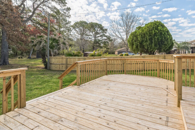 Deck - Charming Fully Furnished Home with Modern Comforts and Prime Location