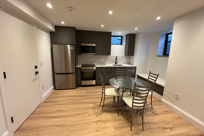 Kitchen and dinning room - Furnished 2-Bedroom Basement Apartment –  New, Stylish & Steps from Transit (Allenby neighbourhood)