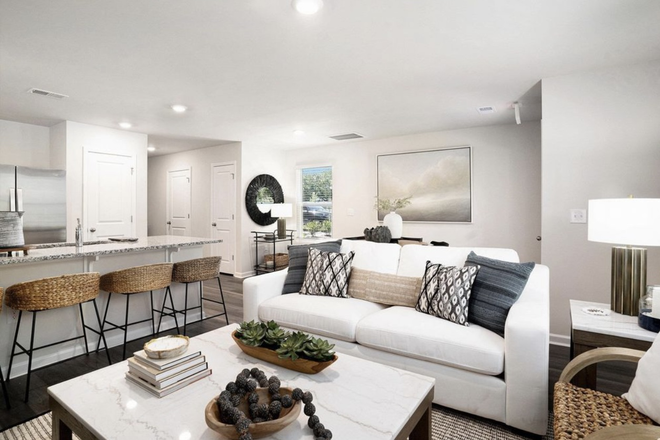 Living room - The Townes At Amber Bluff Townhome