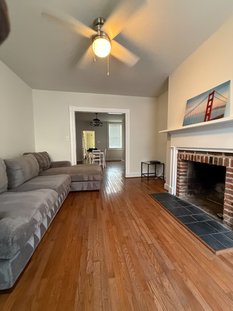 Living Area View: 1st Floor - Bright & Modern Rooms Near UMMC – All Utilities Included. Townhome