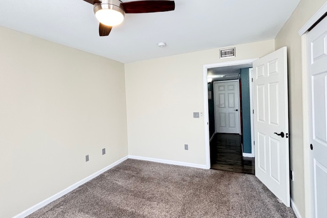 View from window to hallway. Bath is immediately on the left. - Large sunny room w/ private bath in clean condo, 5 miles to campus