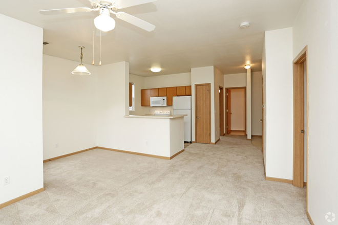 Kitchen/Hallway view from living room - Mane Gate Apartments