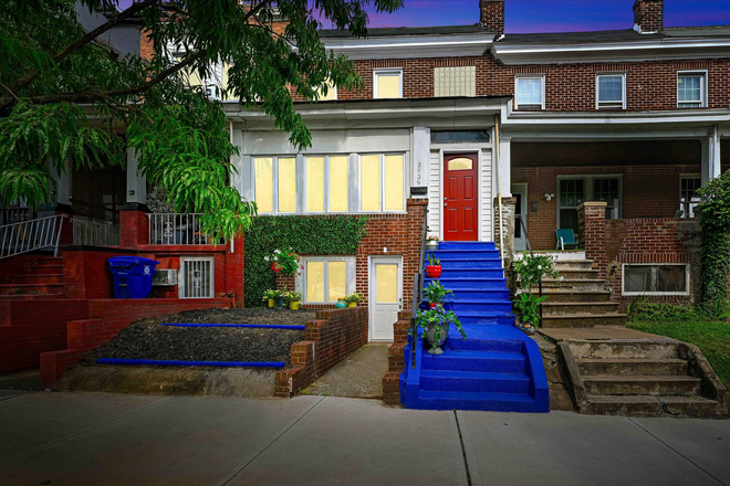 Enters the unit through the red door - 3 bed 1 bath apartment in Better Waverly