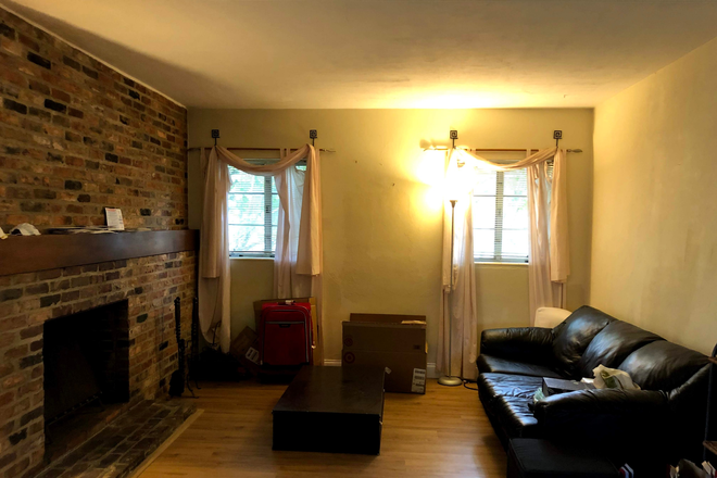 Fireplace area - CG House / 1.1 miles from Campus/Updated and Furnished