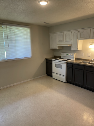 Kitchen - 25/26 - HUGE Apartments in a Quiet Neighborhood - Cats Allowed - Free Internet!