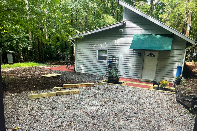 Parking, Cottage and patio - Two bedroom Cottage in the Woods between Durham and Hillsborough Apartments