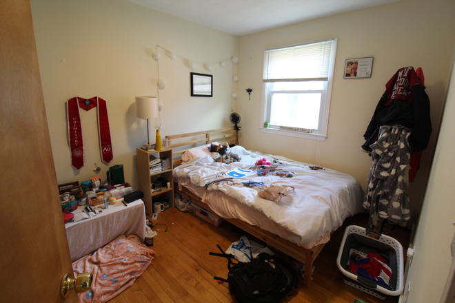 3 - Top floor apartment with private deck near Central T. Quiet street.