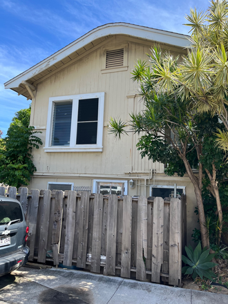 Two-story house from outside - Private room in a two-bedroom unit downstairs located in a quiet neighborhood close to campus Apartments
