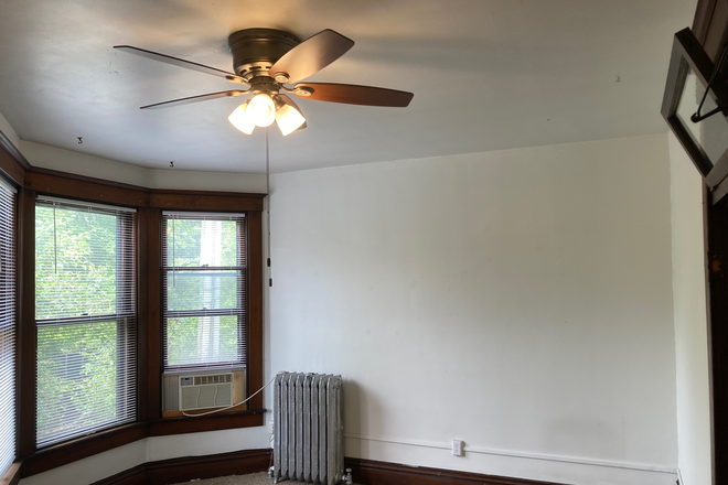 Livingroom with Bay Windows & Historic Radiator - All Utilities Paid!, July Occupancy, One Bedroom spacious upper, private, quiet, $920 Apartments