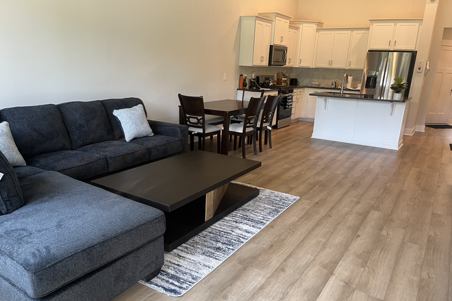Living room and Kitchen - The Grange Townhome