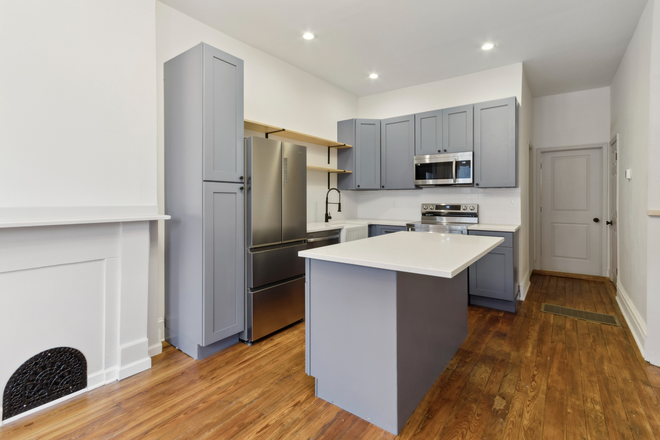 Kitchen - 4 bed / 2 full bath house in Temple University area with new interior and soaring ceilings.