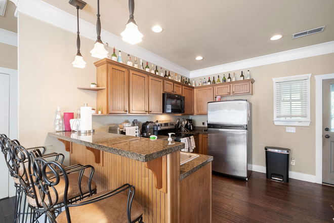 Cottage Grove's Kitchen: includes storage, stainless steel appliances, a dishwasher and refrigerators with a built-in water filter - Live in Your Own House! Cottage Grove at Gainesville