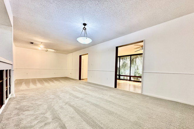 Living / Dining - Condo overlooking Bivens Lake, with pool, new washer/dryer in unit, & new stainless steel fridge