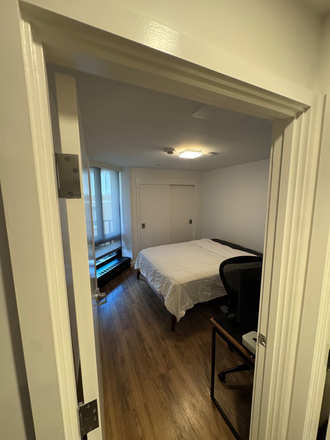Bedroom with room for standard desk and Herman miller desk chair - Furnished 1BR Sublet at Soldiers Field Park — Steps from HBS Apartments