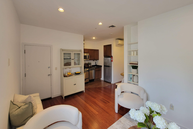 Living Room to Kitchen - Modern 1 bed! In-Unit W/D. Near Lechmere & Kendell Square! Condo