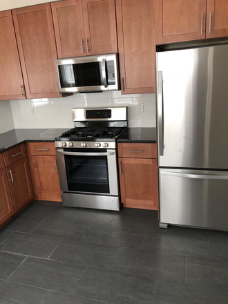 Kitchen - Beautiful 3-bed, 2-bath unit available 9/1/25!