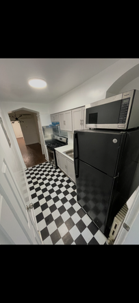 kitchen second view - The Commons at Fort Stevens Apartments