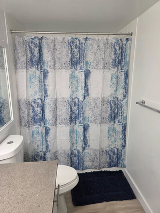 Private shower - Flats on the Greens Apartments