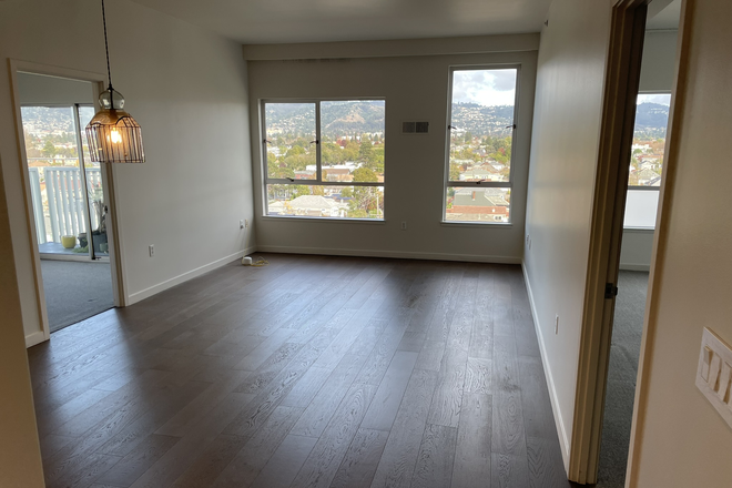 Living Room - Modern Top Floor Condo Unit with Views, Elevator, Parking and Roof Deck