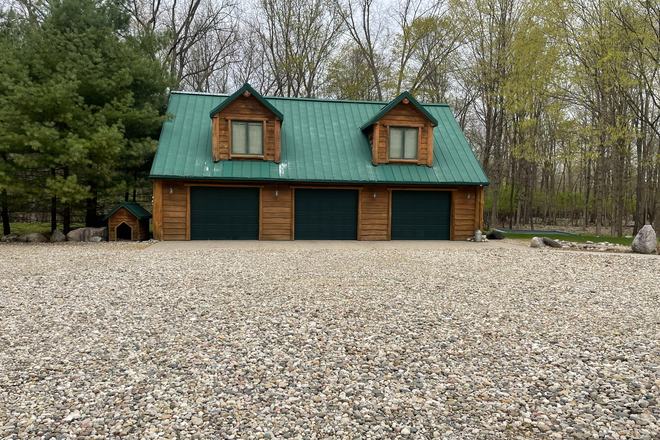 Front of Apartment and garage - 900 SqFt Apt for rent on 18 acres and St. Joseph River. 15 Minutes from Notre Dame Campus