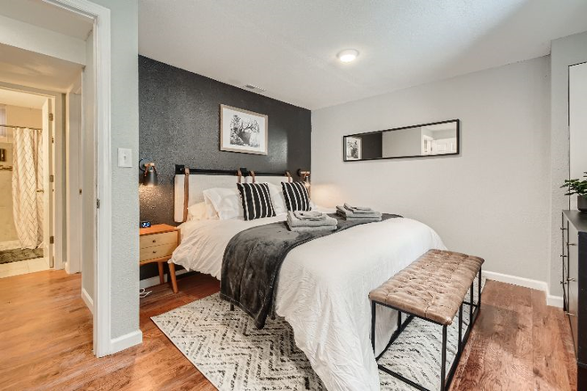 King Bedroom - Adorable 2 bedroom 1 bath basement located near the airport and Anschutz Medical Campus Apartments