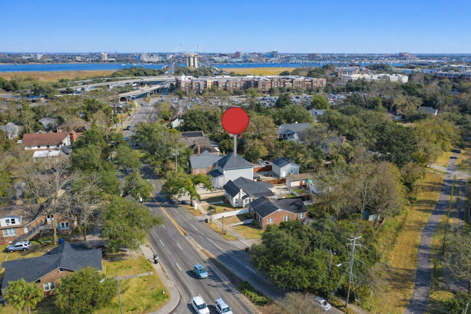 Aerial location footage to show how close to Downtown and surroundings/bike path behind the house to connect to Downtown! - 4 bedroom includes utilities off street parking 1 mile away from hospital area!!! House