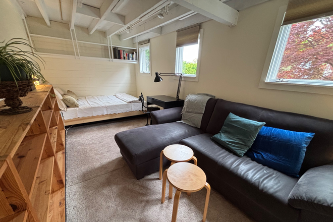 Living space - Garden level studio with easy commute and free parking House