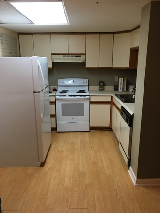 View of kitchen from living room - Bellevue subdivision Apartments