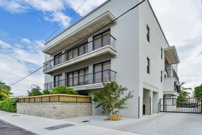 Building Exterior with Gate - Furnished Rental Units Near Miller School, Jackson Memorial and UHealth Hospitals