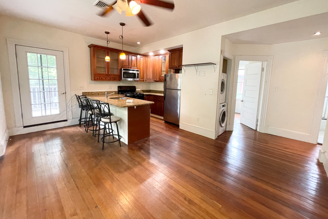 kitchen - living room - Spacious and Sunny 4 bed 1 bath apartment! Laundry in unit, Central A/C