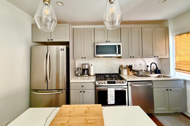 Modern Kitchen with Stainless Steel Appliances - Modern 3BR/2BA Townhouse near H St Corridor | $3,200 | Furnished Opt.