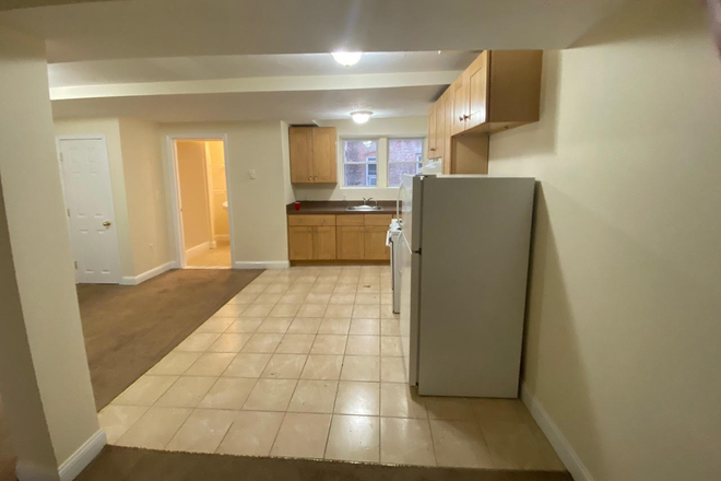 Visit hubrealtyproperties.com - Large one bedroom, basement level, on the T in Mission Hill Apartments