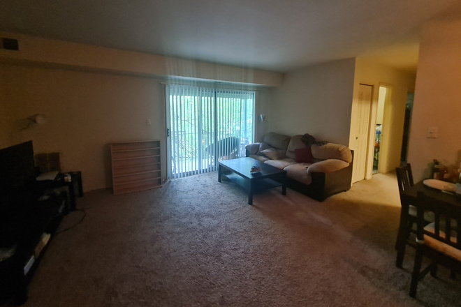 Living room - Looking to sublease the bigger room in a 2x1 apartment near UMD