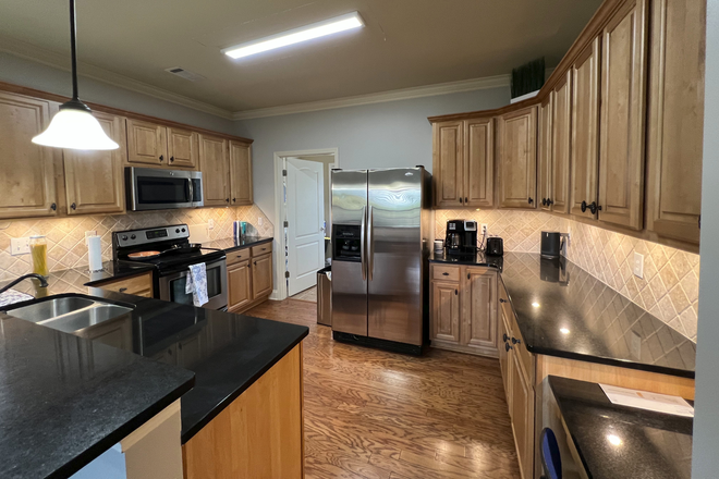 Kitchen - West Glenn Unit, 1 Bed/1 Bath - 12-Month Lease Apartments