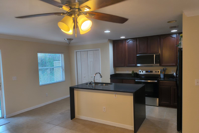 Kitchen. - Townhome Close to Campus - 20 Minute walk. Female Roommate Preferred.