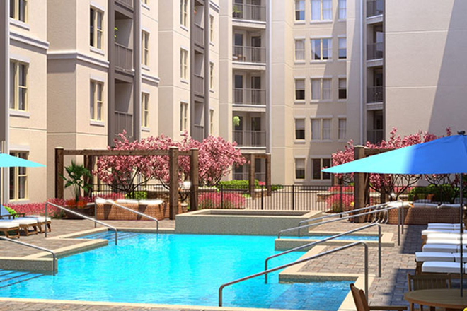 Pool and common area of complex. - URGENT: Younion Fayetteville Pool View Sublease – $700 Apartments