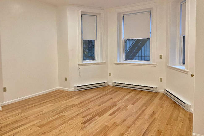 LIVINGROOM - NO BROKER FEE - ONE BEDROOM APARTMENT WITH A PRIVATE YARD AT 1077 BEACON ST AVAILABLE 9/1/2026