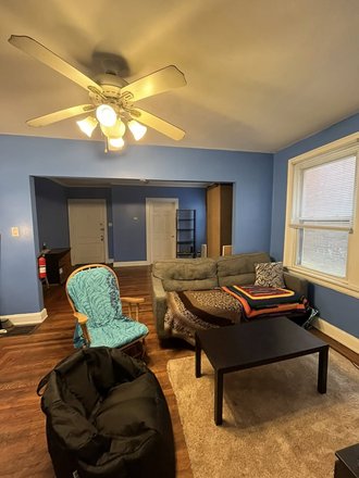 living room, walls repainted to silver colour - 477 Riddle Rd, Apartment 1