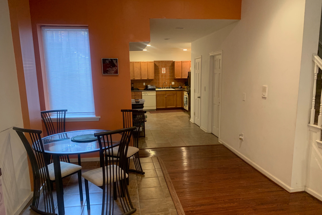 Kitchen and dining area - 3BR en-suite Furnished Town-House with Rooftop Deck.  Utilities & Parking Included. Walk to Campus