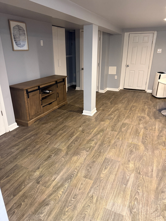 Living Room Area - Charming Basement Studio Close To Howard U and Catholic Campuses Apartments