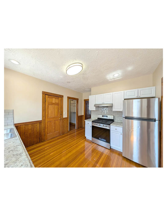 Kitchen - Top floor 3 Bedroom offers an abundance of sun splashed living space! Apartments