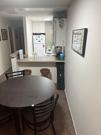 Kitchen and table (note this is from when I took a tour, I am not this messy) - Cedar Village